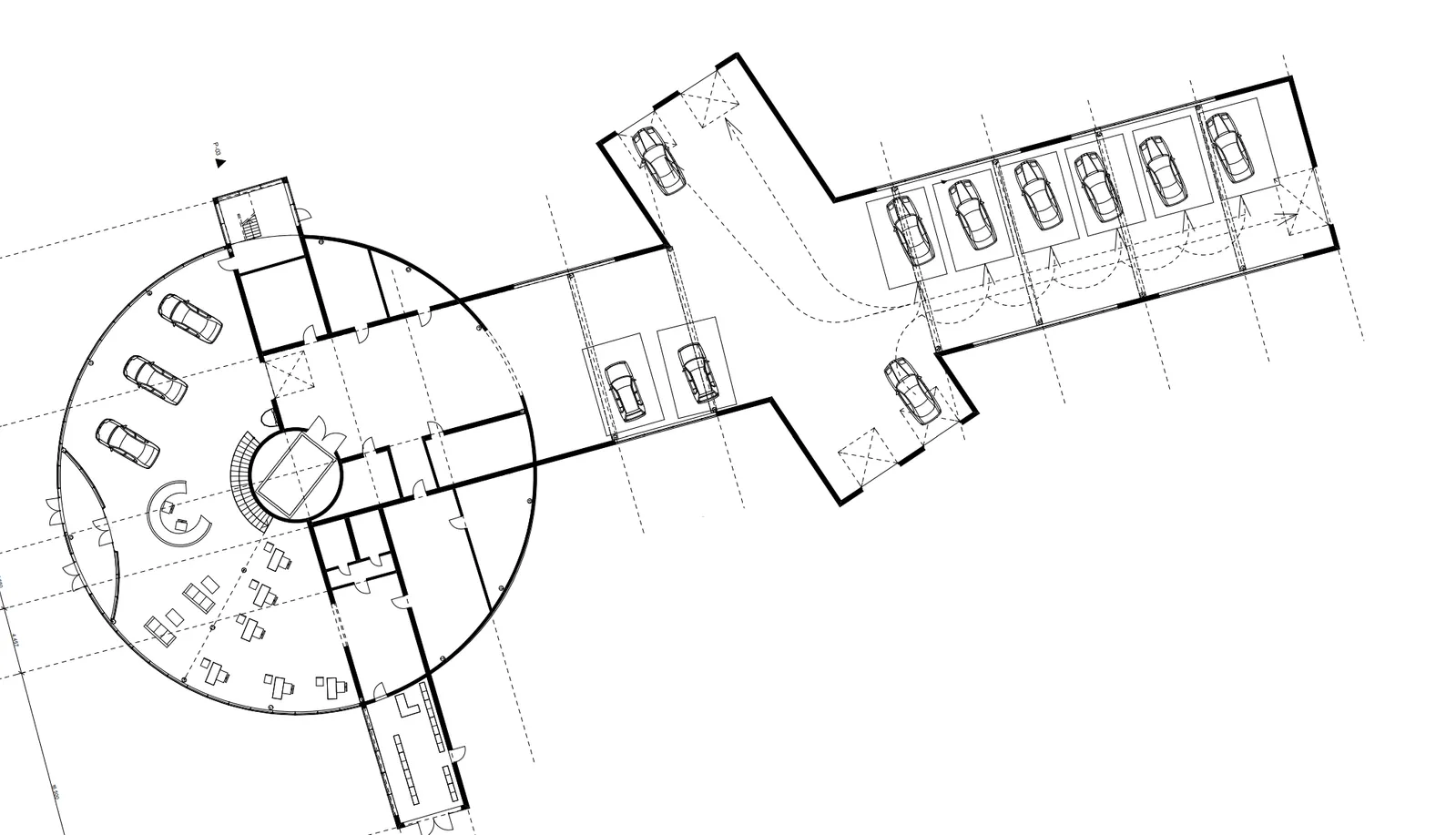 Plan of the car dealership — a radial showroom and a linear service wing