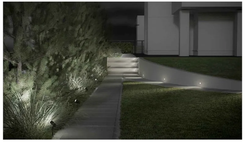 Garden steps lit at night with recessed lighting